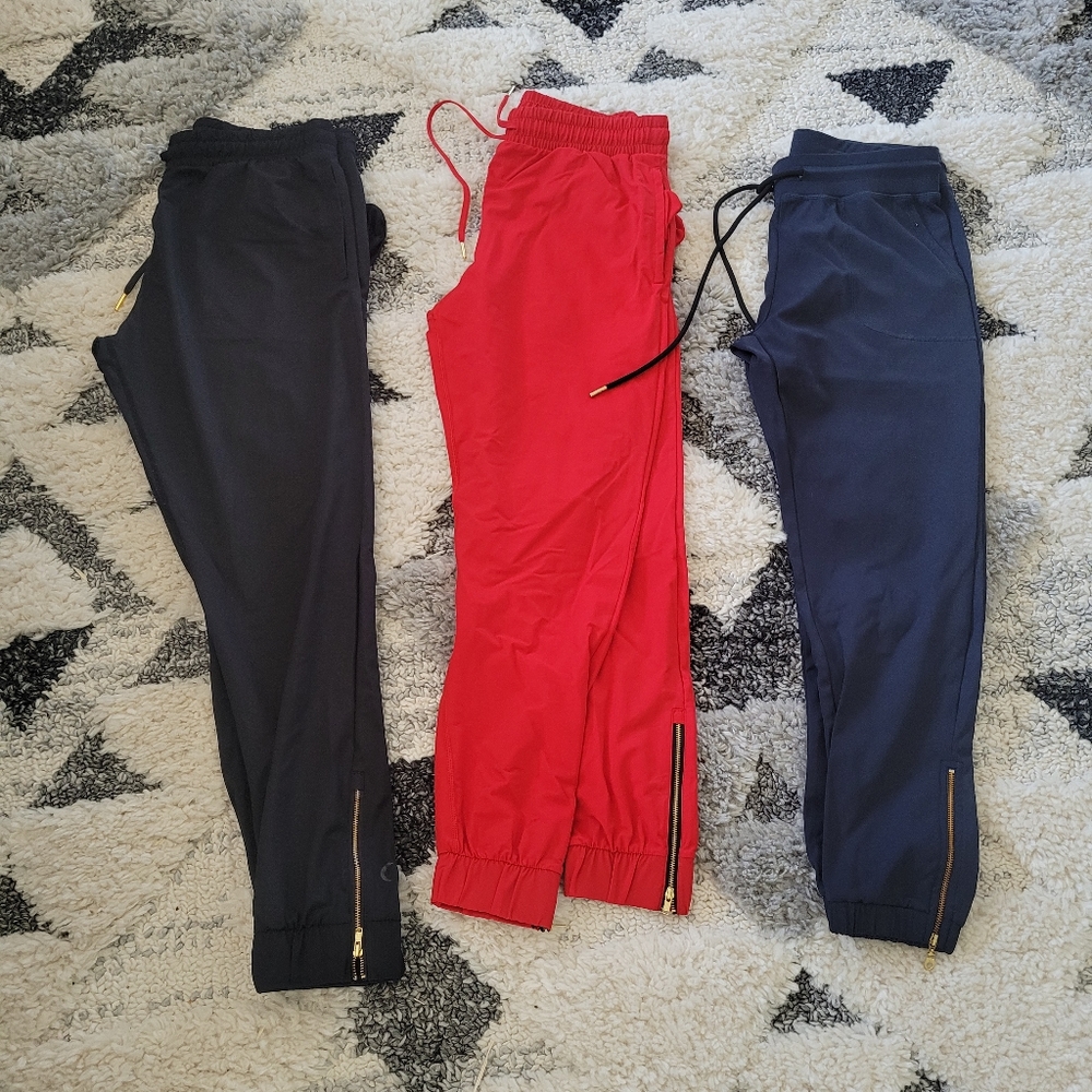 Zyia.  Black are a small red and navy are xsmall.  All in brand new condition.